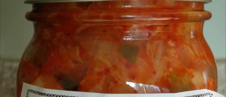 A close-up photo of a jar of Kimchi